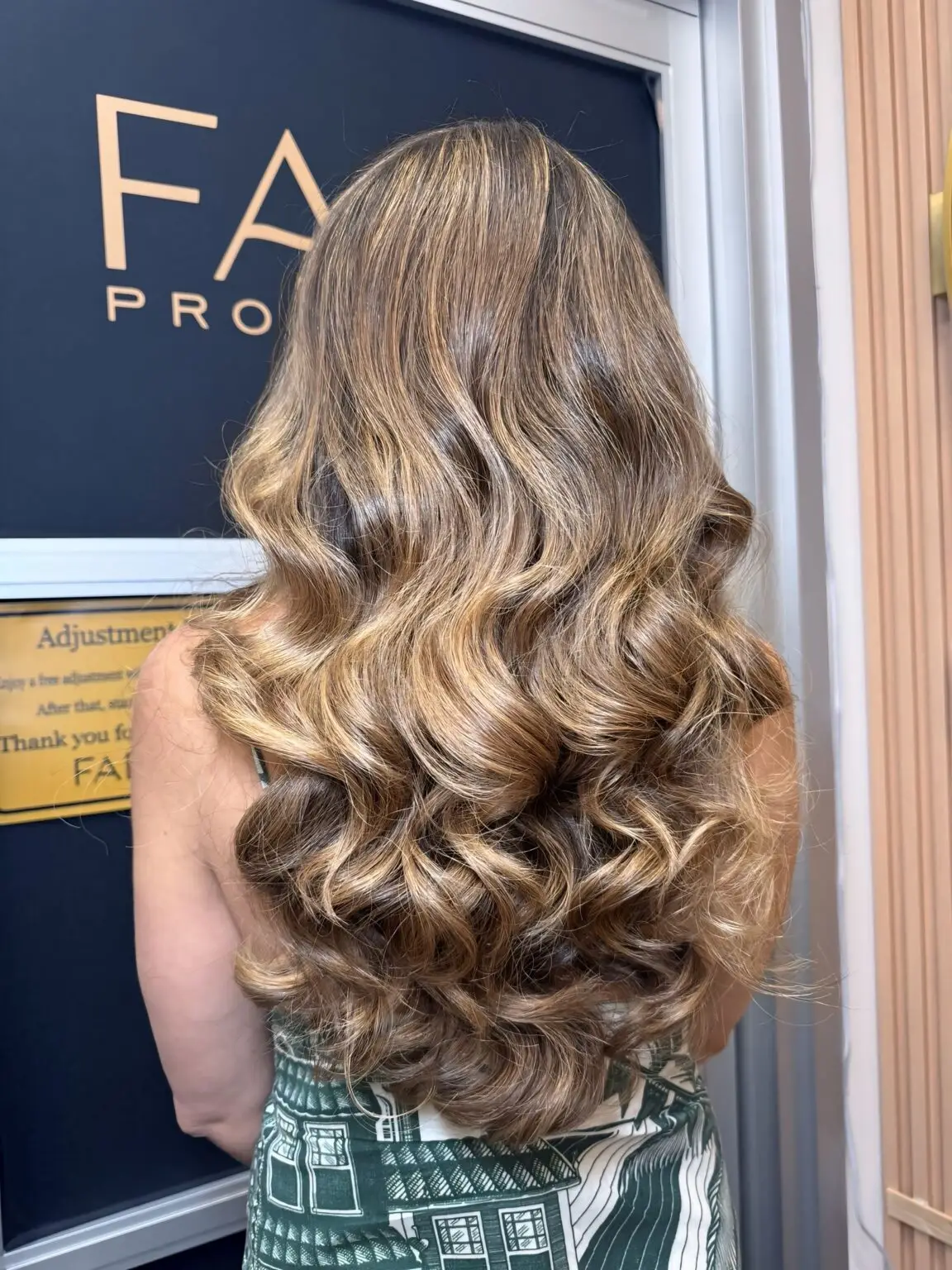 Bunette balayage with styling waves by Fabiana Cohen at Fabi Pro Beauty, Midtown East Manhattan NYC -dimensional and glamorous