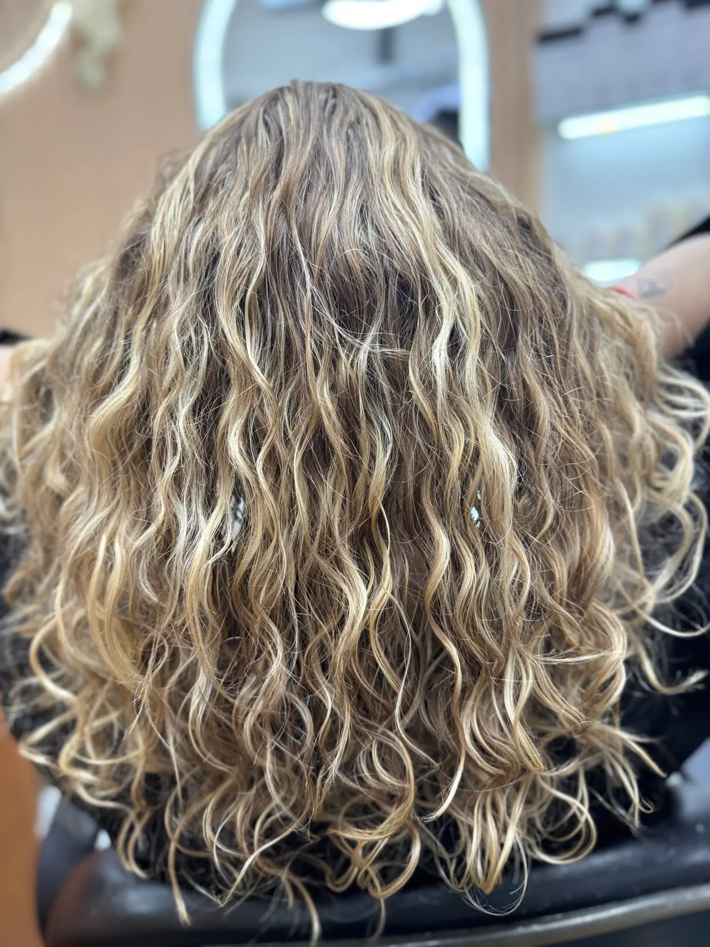 IMG_2648 Curly cut with blonde balayage by Fabi Pro Beauty NYC