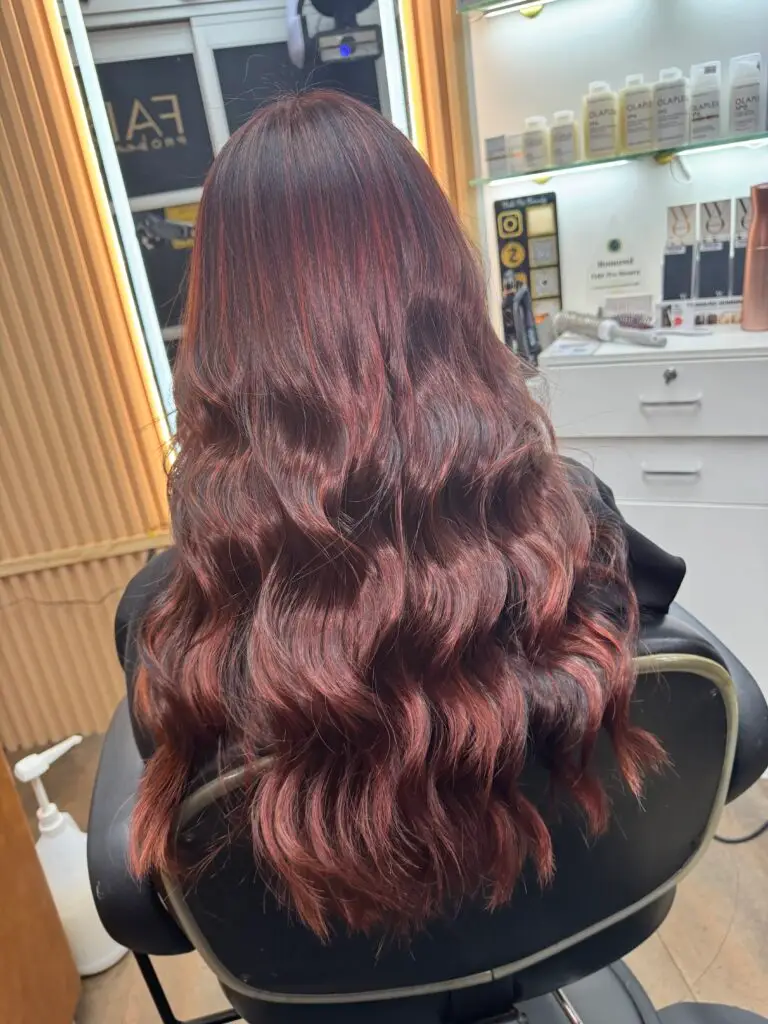 Master colorist creating dimensional brown balayage at Fabi Pro Beauty NYC