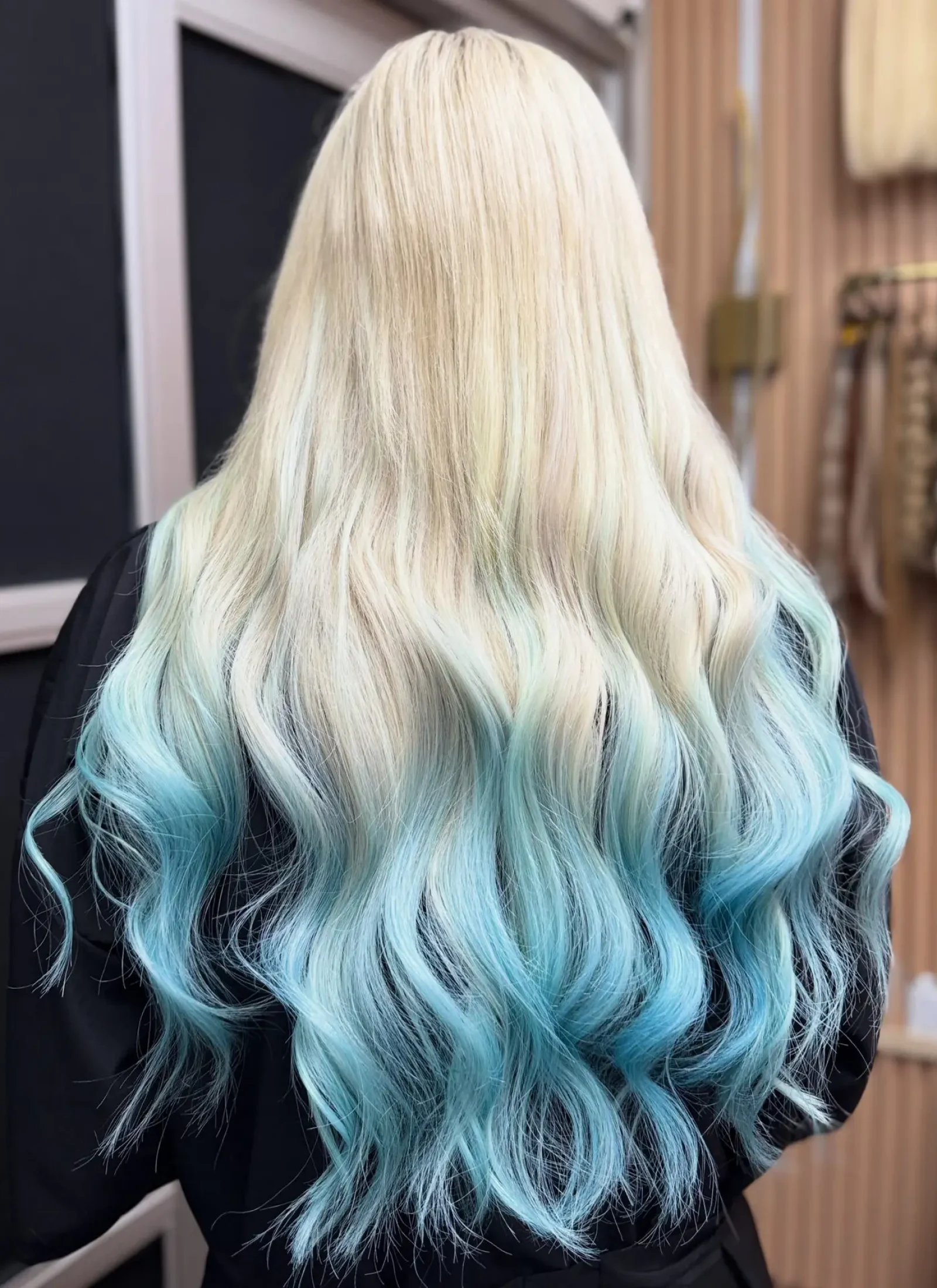 4944F72A-EF50-4CD1-B5EE-071F5B0D9D6A Double process with fashion color, - blonde base enhanced with teal tones and hybrid hair extensions for lenght, volume and perfect finish